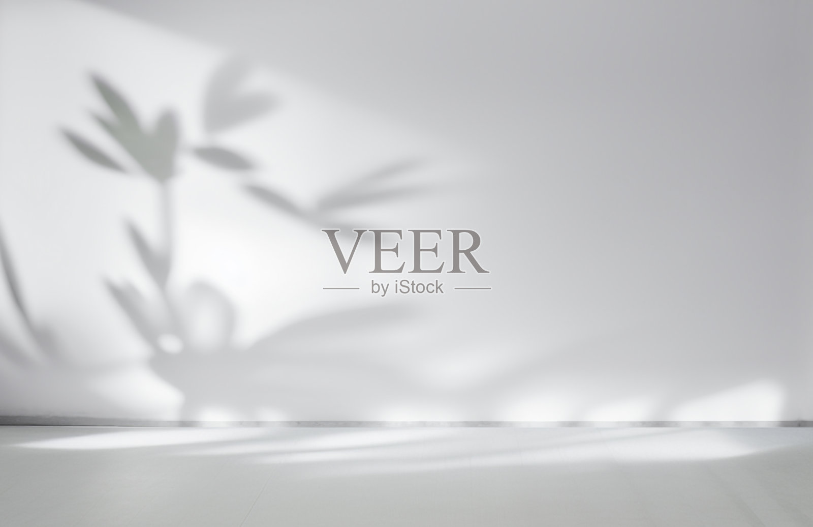 用于设计或产品展示的原始背景图像，浅灰色色调，带有光影效果。照片摄影图片