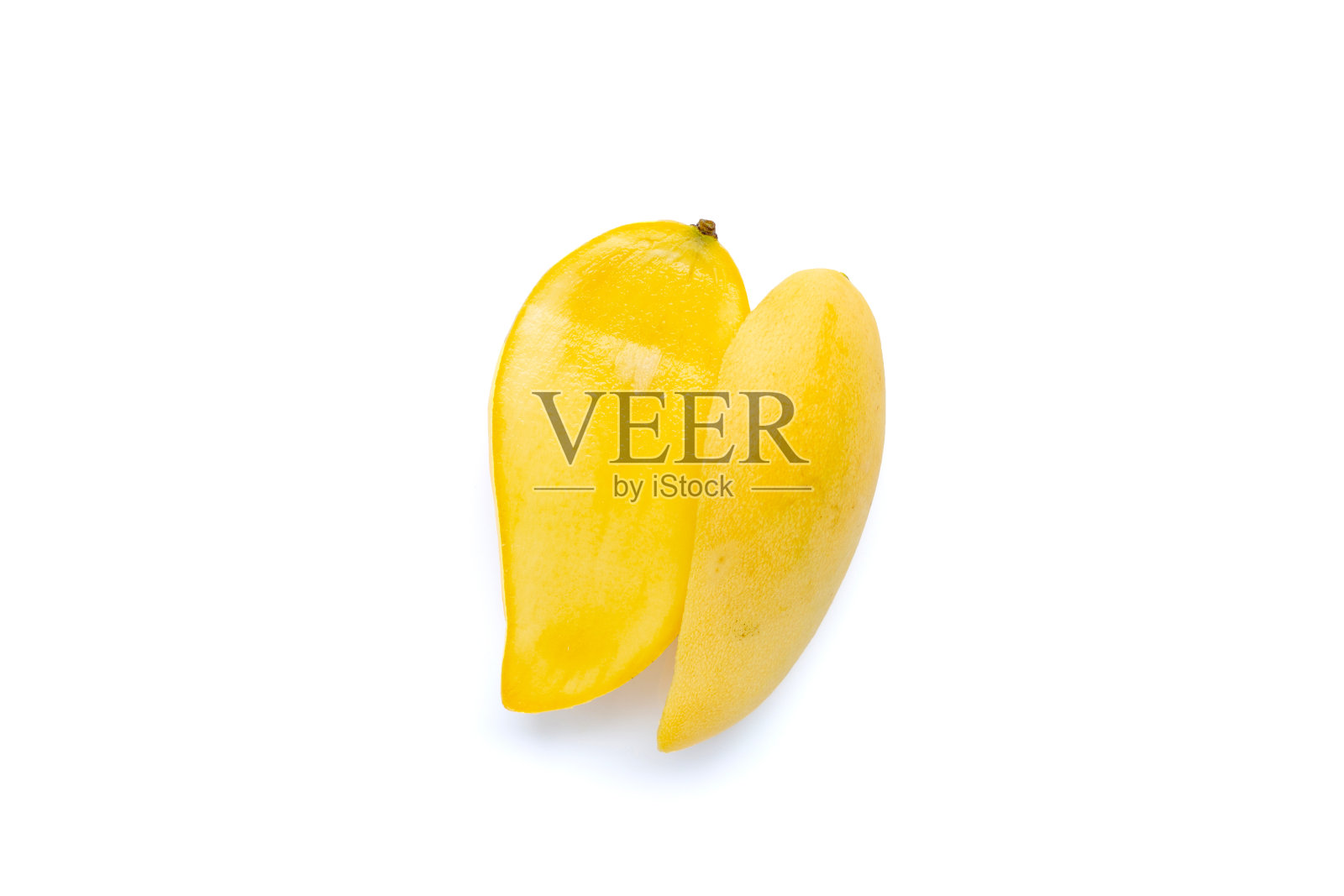 热带水果，白色背景的芒果。照片摄影图片