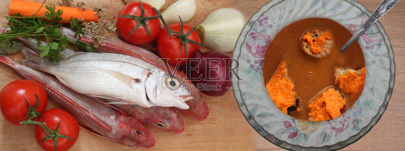 鱼汤，配面包丁和肉酱。上菜的食材放在厨房的工作台上照片摄影图片