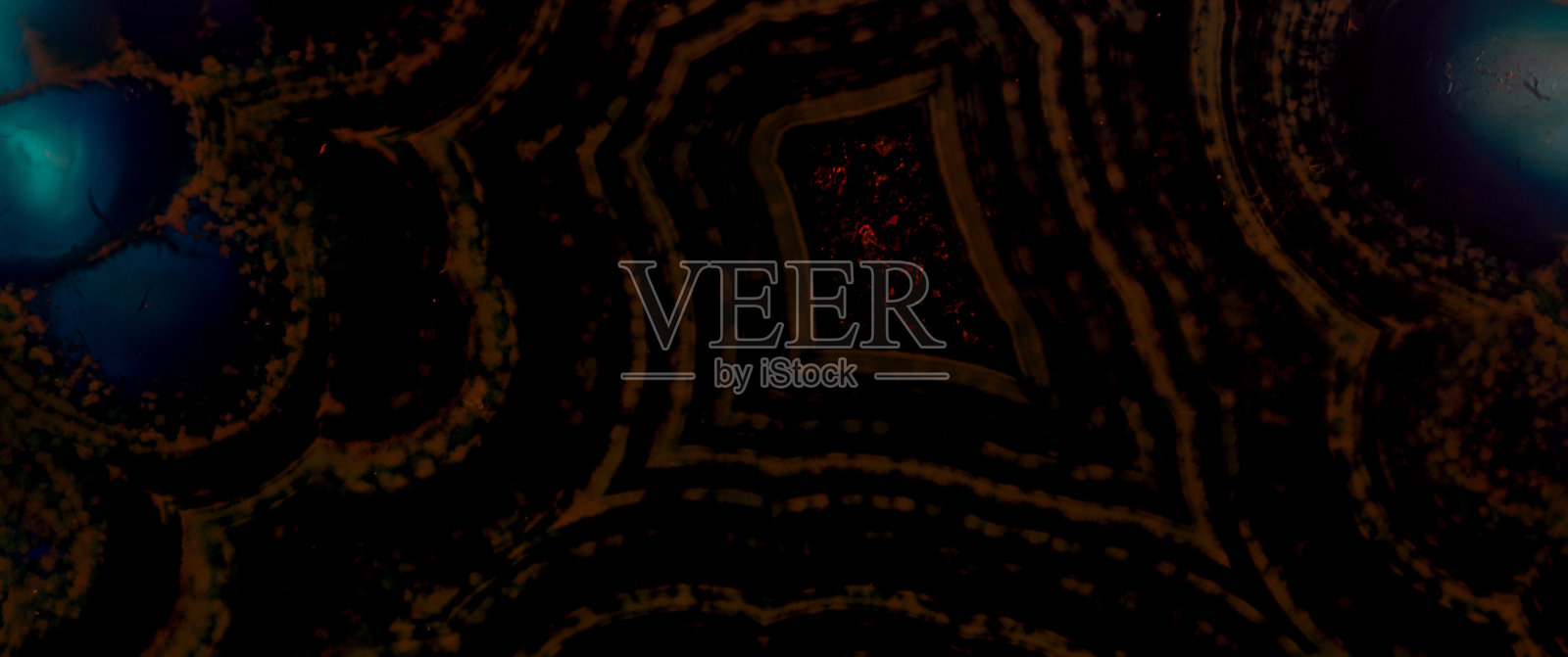 彩色美丽的花式水晶背景纹理的化石。照片摄影图片