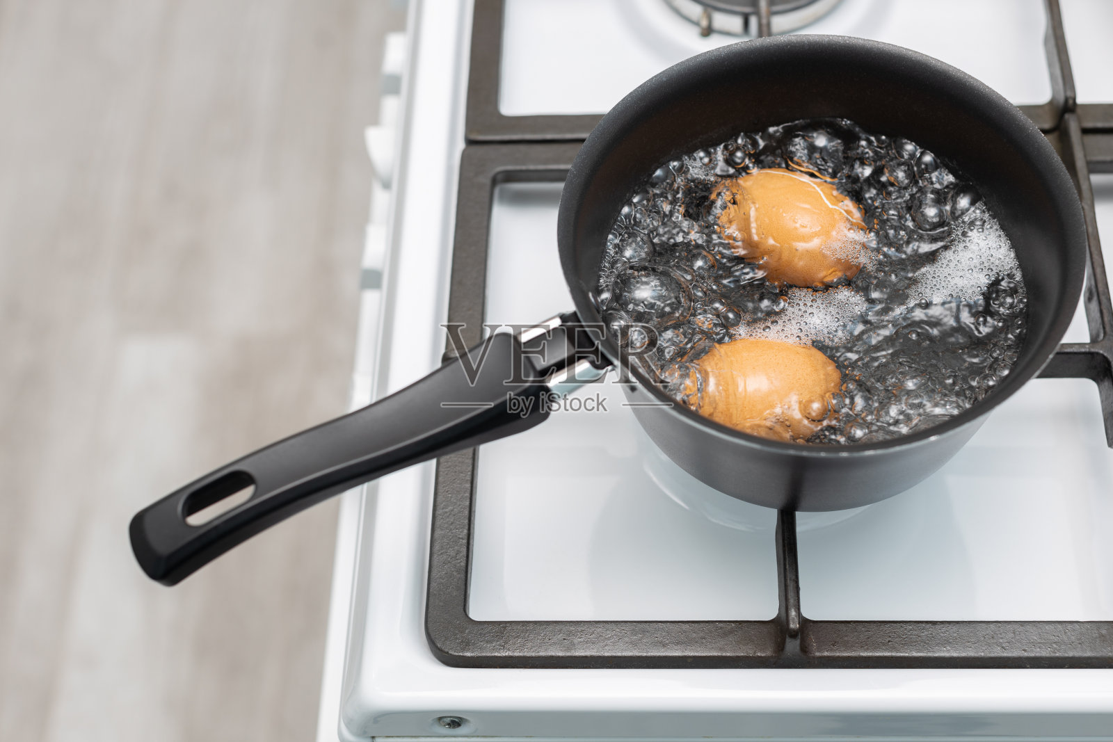 煮鸡蛋的锅照片摄影图片