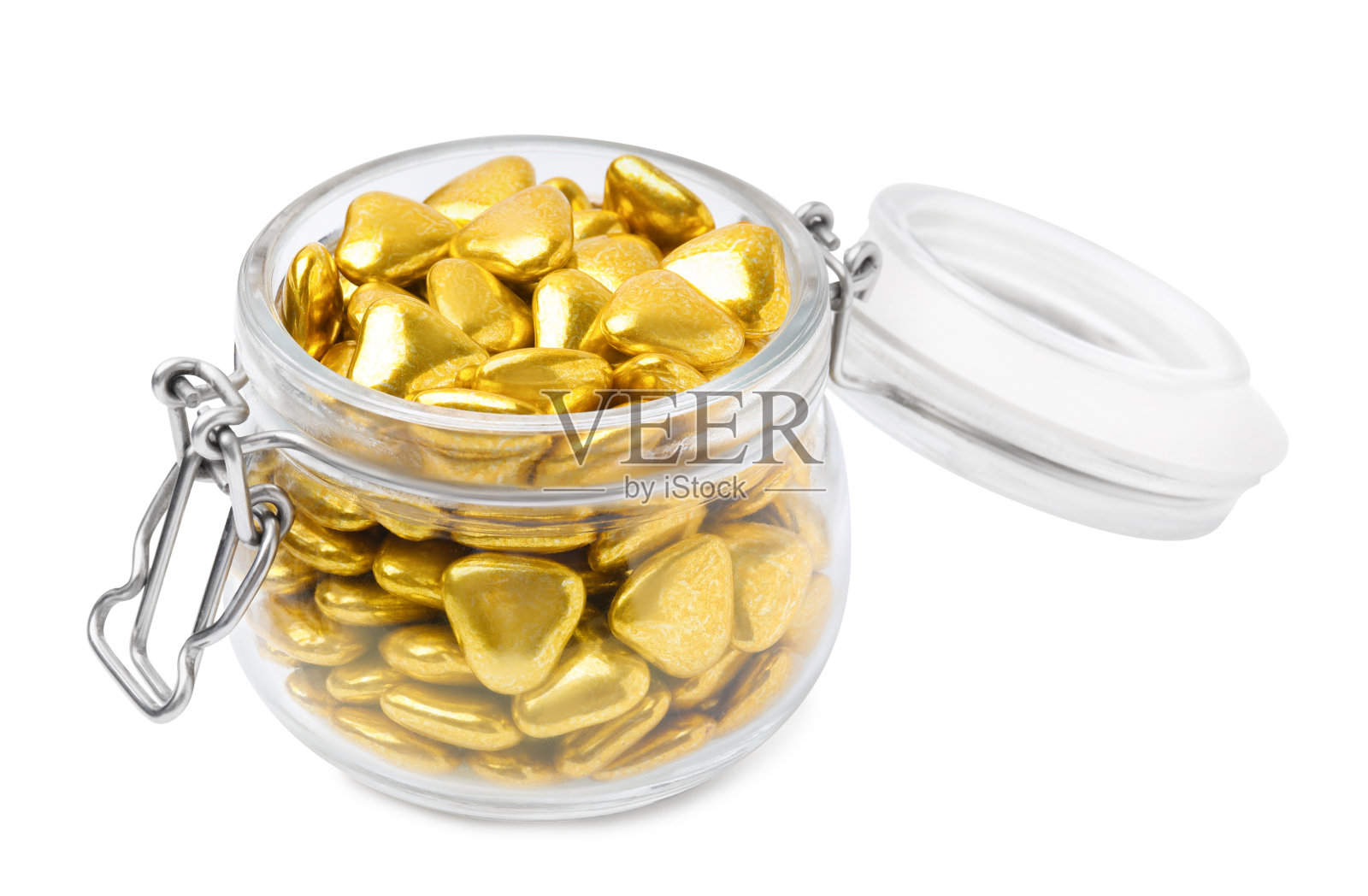 白色背景上有美味心形糖果的罐子照片摄影图片