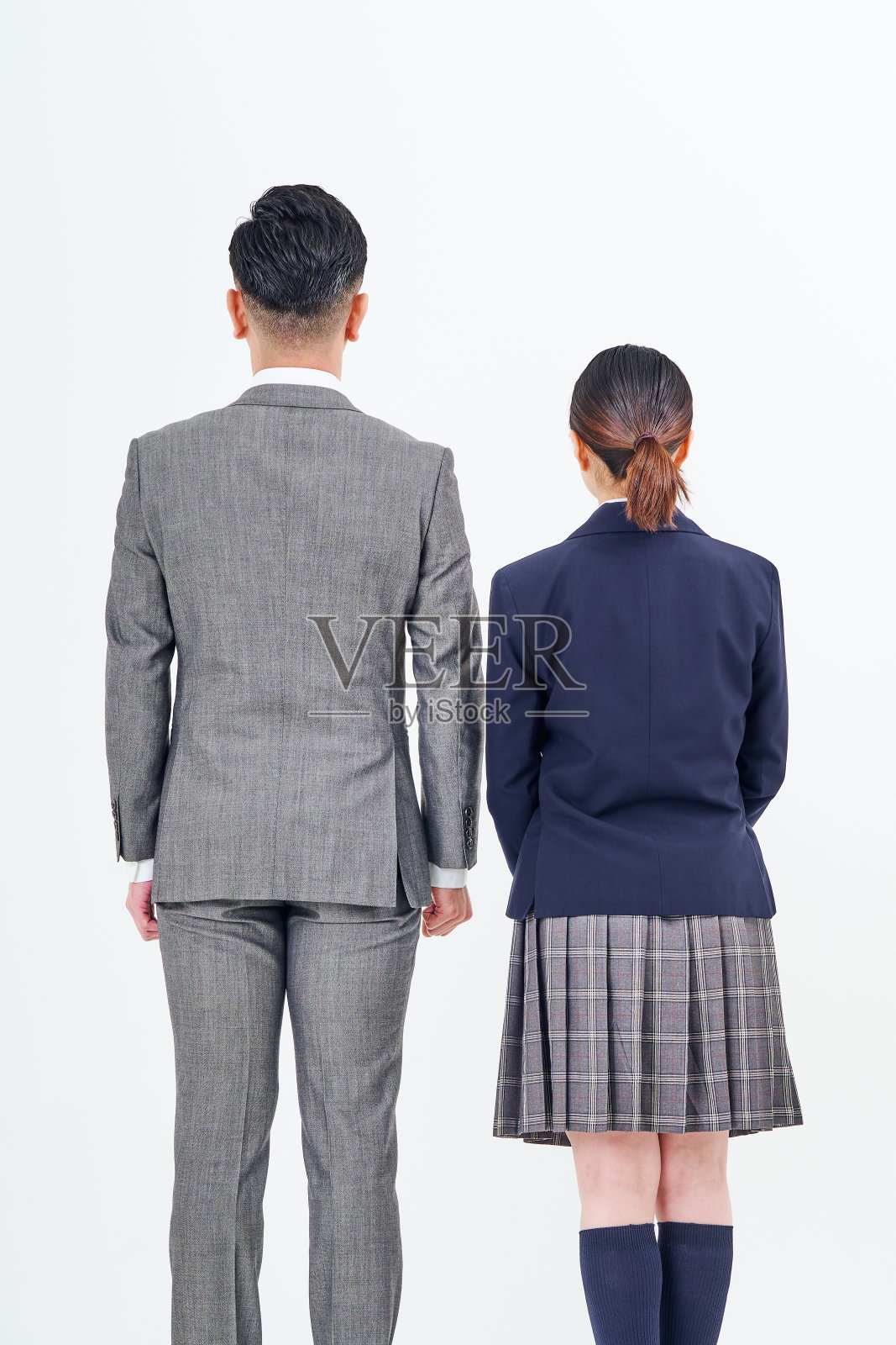 一个西装男和一个高中女生照片摄影图片