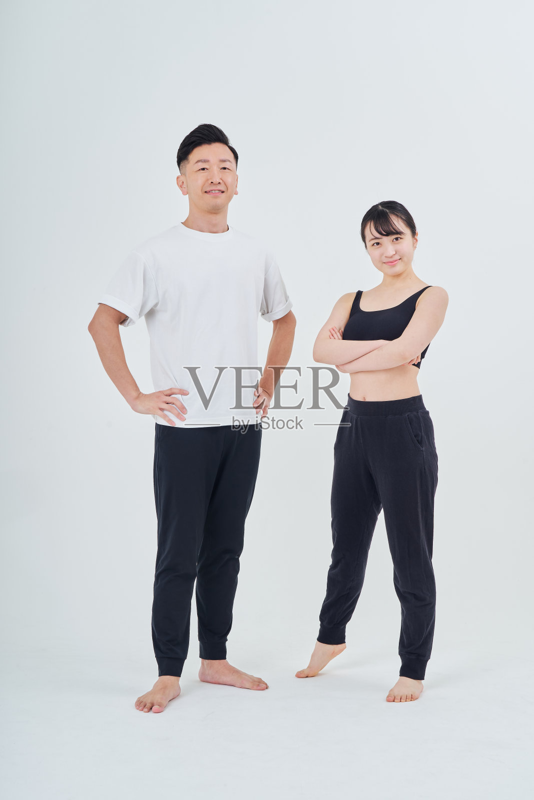 穿着运动服的男人和女人照片摄影图片