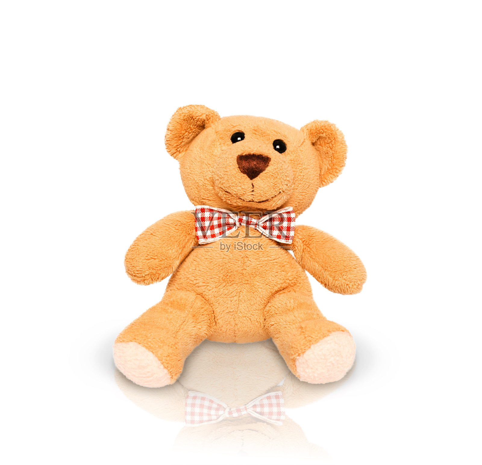 带着蝴蝶结的泰迪熊照片摄影图片