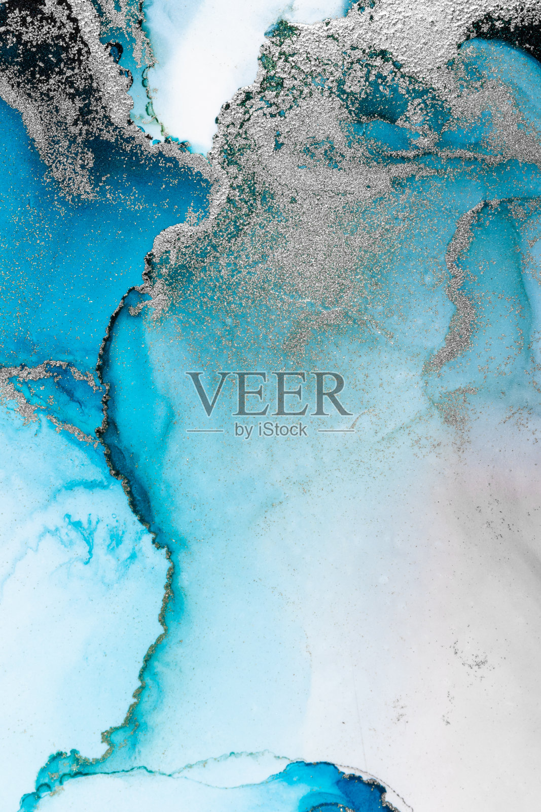 蓝色银色抽象背景的大理石液体水墨艺术画在纸上。图像原画水彩酒精油墨油漆在高质量的纸张纹理。照片摄影图片