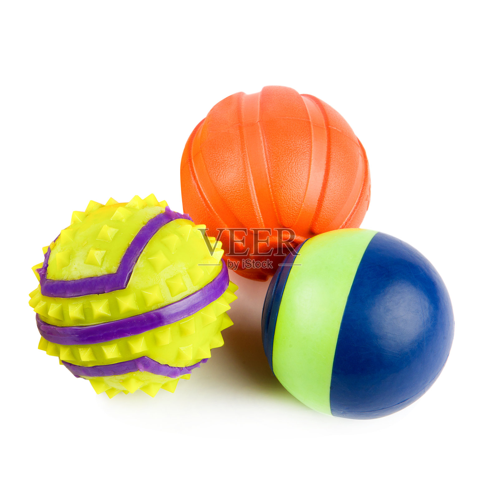 球——专为白色的狗设计的玩具。照片摄影图片