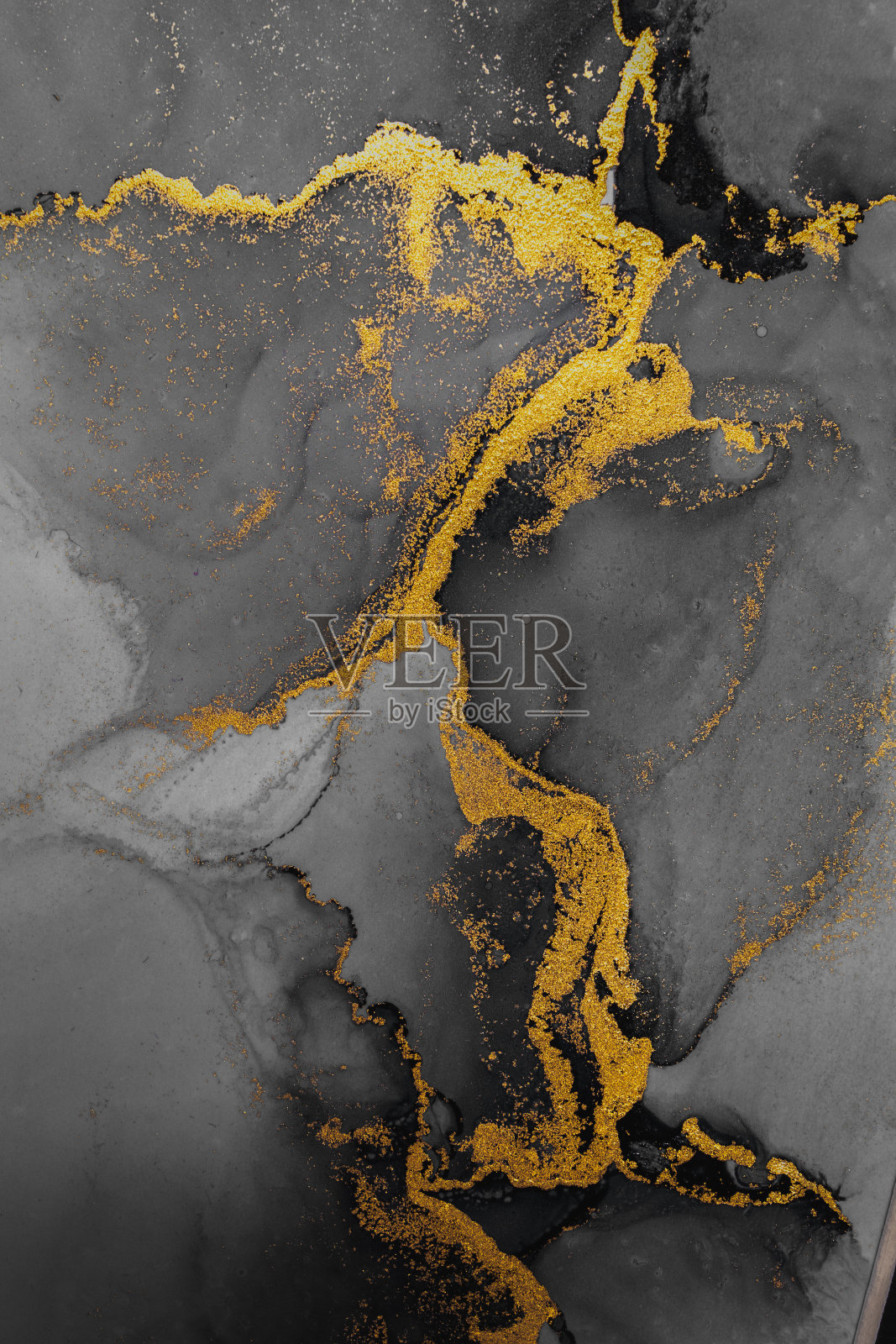 暗金色抽象背景的大理石液体水墨艺术画在纸上。图像原画水彩酒精油墨油漆在高质量的纸张纹理。照片摄影图片
