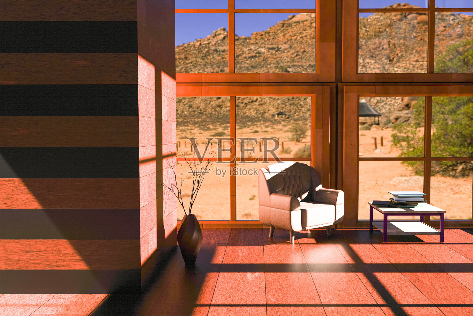 客厅内饰有木墙、木拼花、沙发、书桌和装饰性陶瓷，可以看到沙漠景观。照片摄影图片