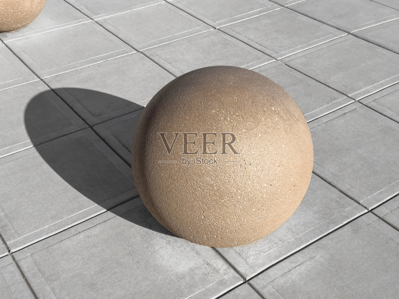 人行道上的大混凝土球体照片摄影图片