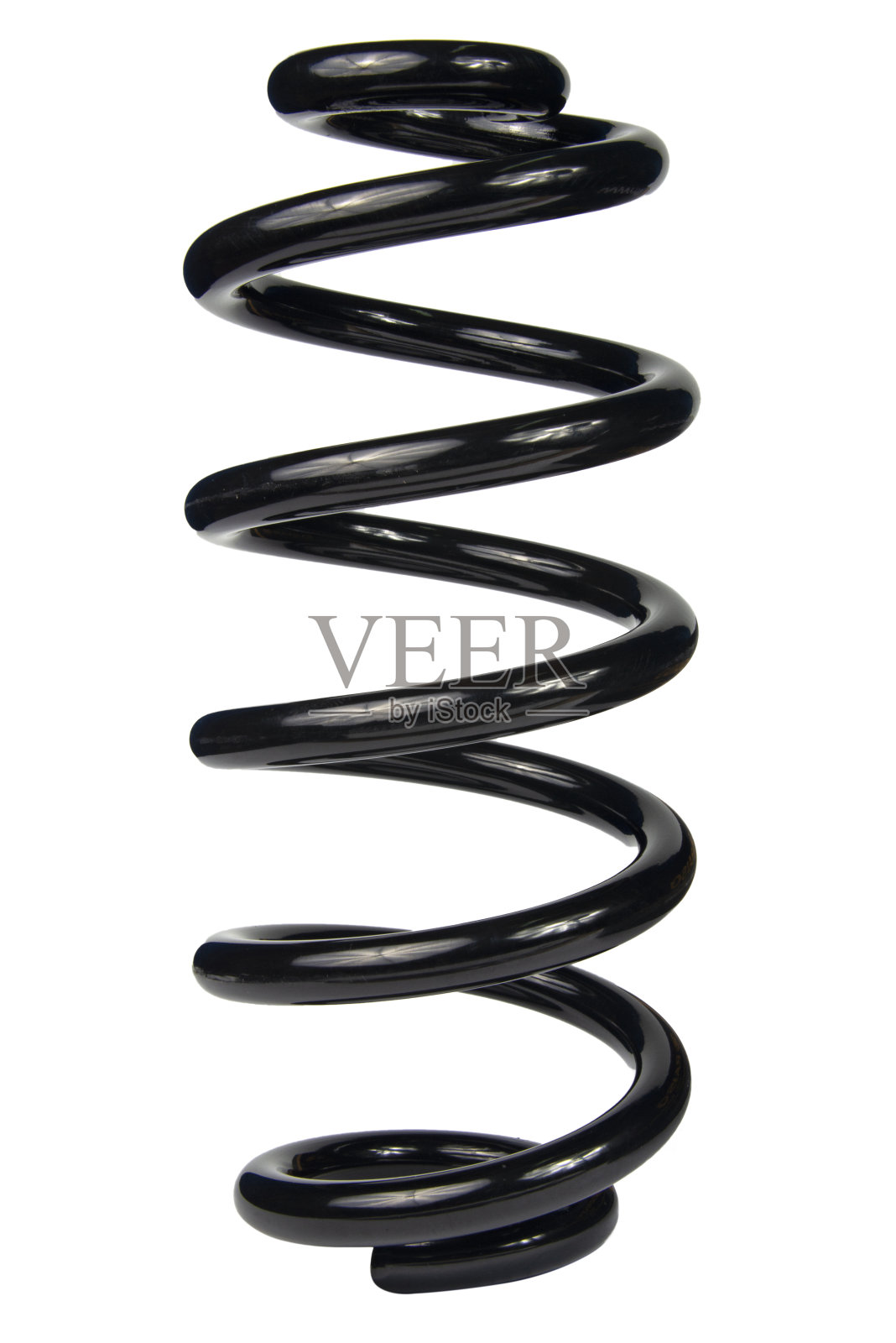 汽车备件。白色背景上的大金属弹簧。白色背景缓冲弹簧，汽车配件。白色背景上的汽车悬挂弹簧照片摄影图片