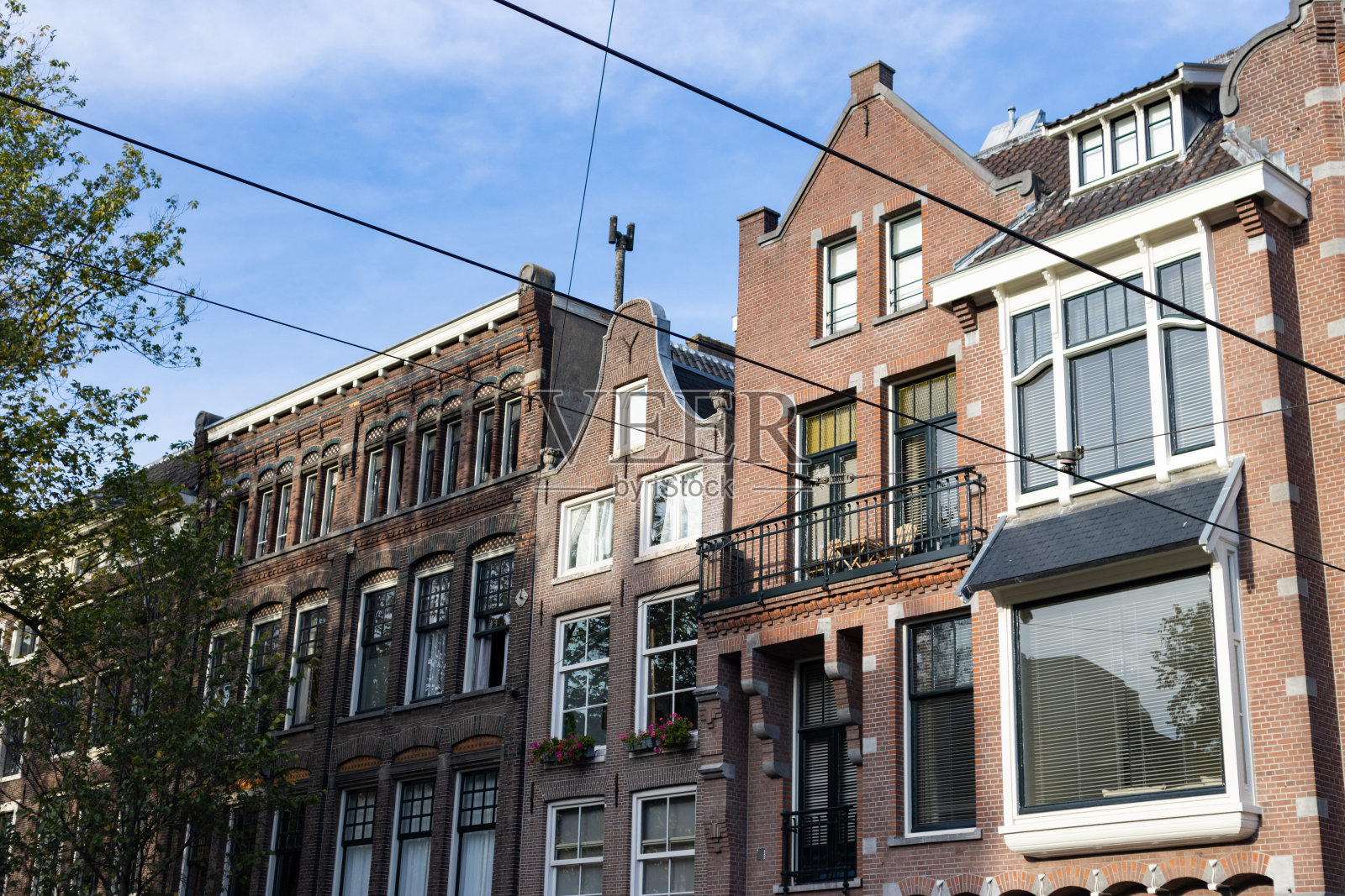 阿姆斯特丹Leidseplein社区的一排美丽的老砖建筑照片摄影图片