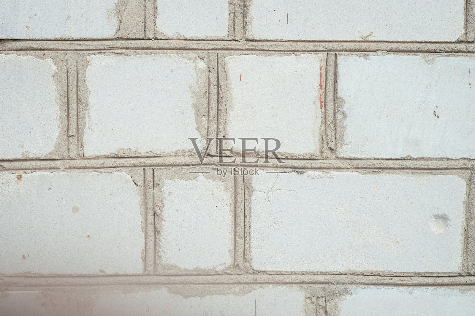 外墙的白色砖墙特写。白色砖墙纹理或背景照片摄影图片