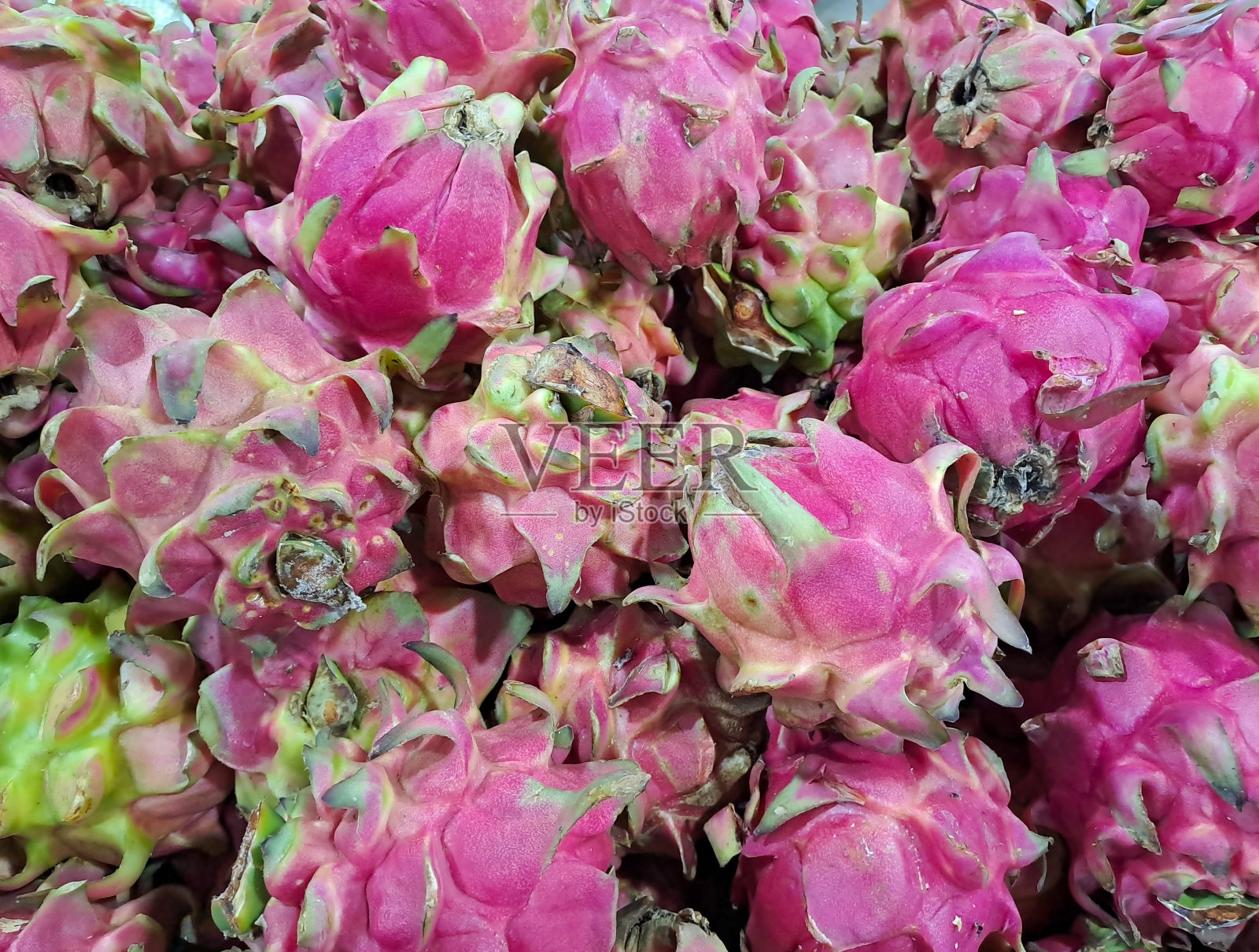 火龙果或火龙果堆照片摄影图片