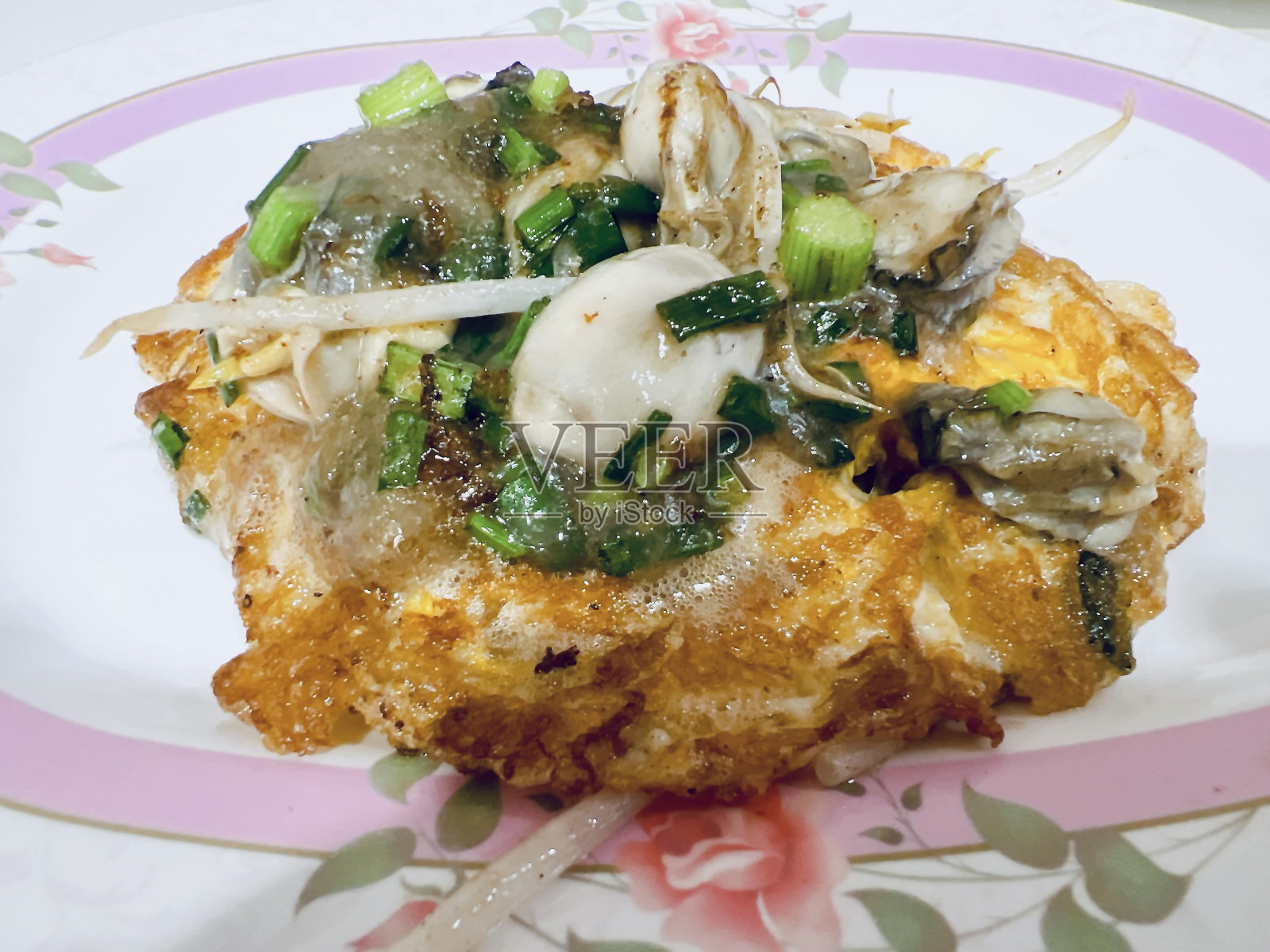 平底锅炸酥脆蚝。照片摄影图片