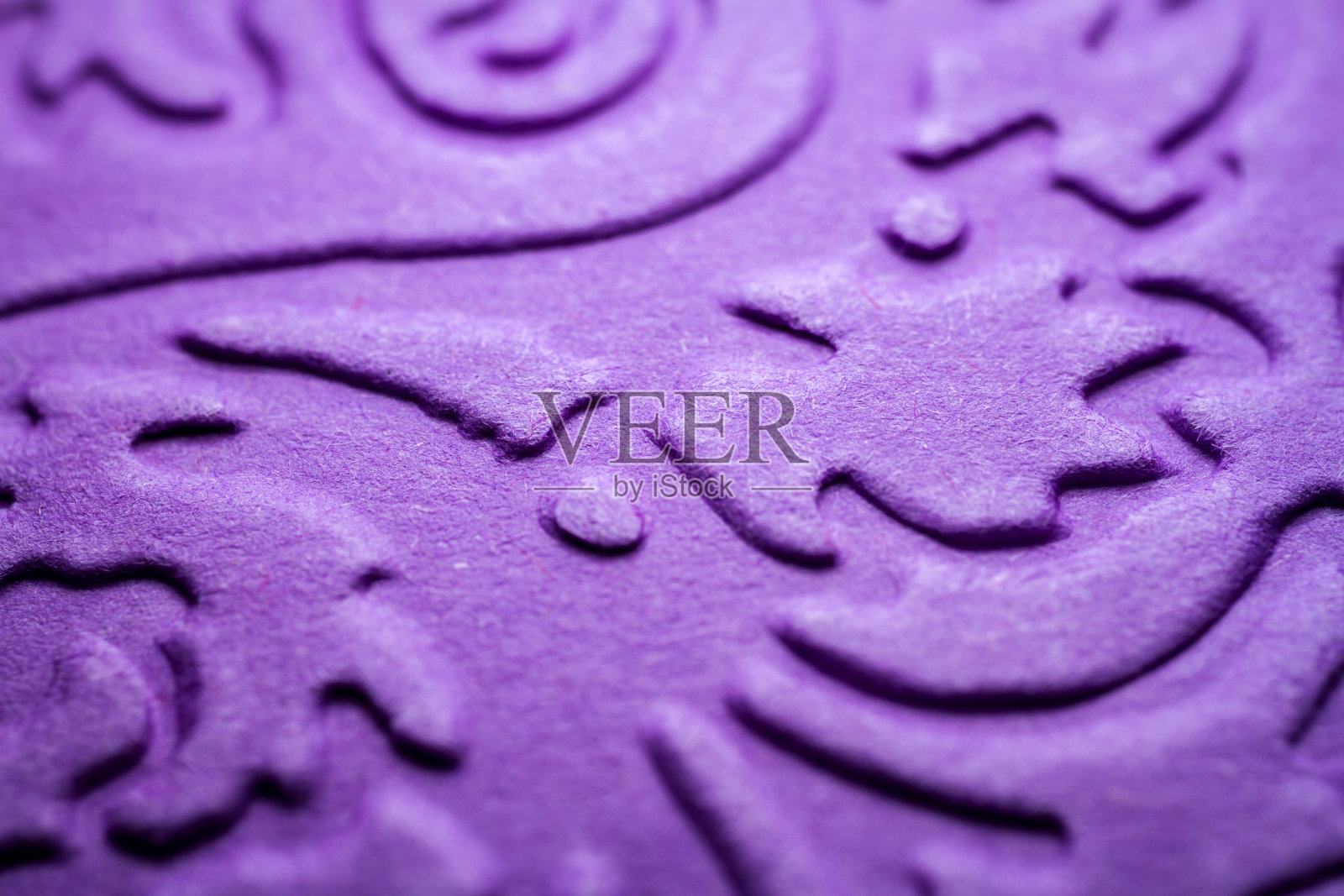 极端宏观的压花紫色纸照片摄影图片
