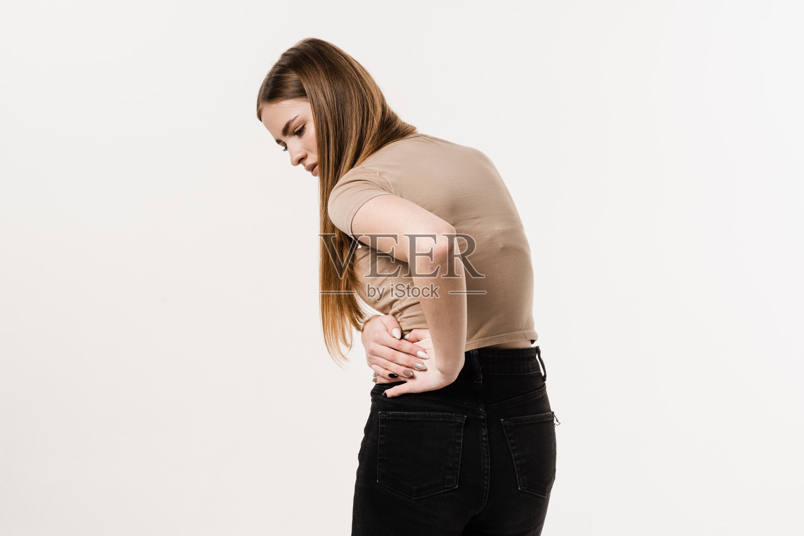 肾脏感染肾盂肾炎尿路感染。女孩因UTI肾盂肾炎而感到腰酸背痛。照片摄影图片