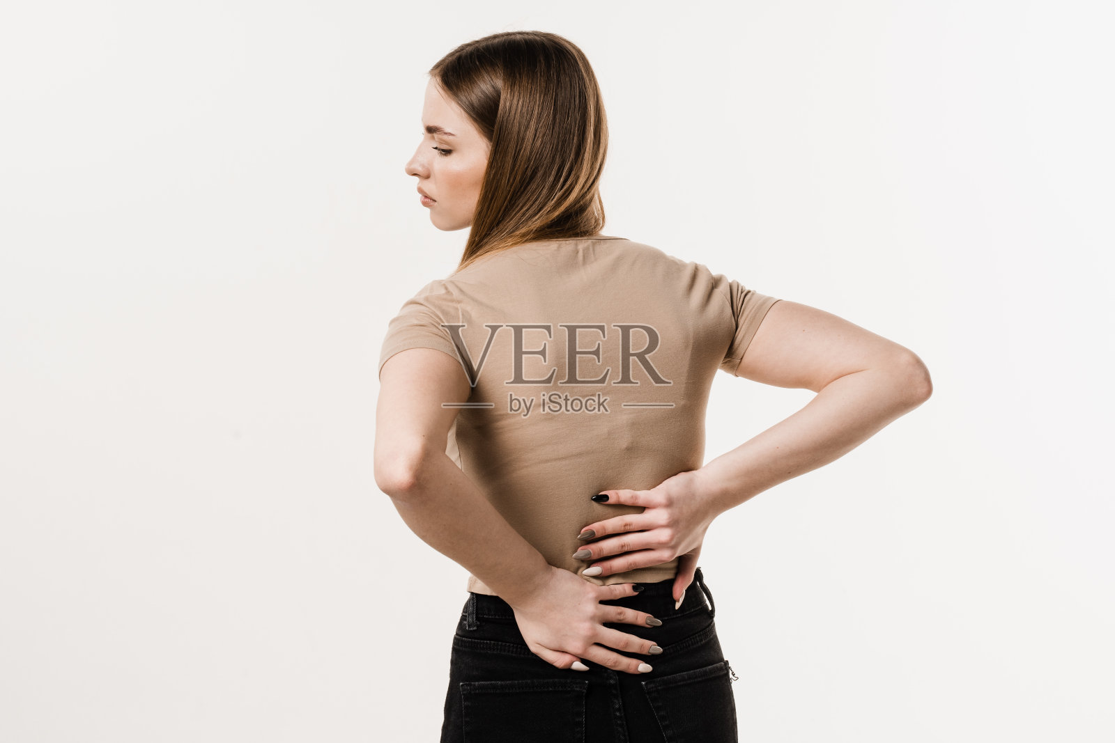 脊柱侧弯是脊柱的侧曲。Rachiocampsis bachache的女孩。风湿病和关节炎。照片摄影图片