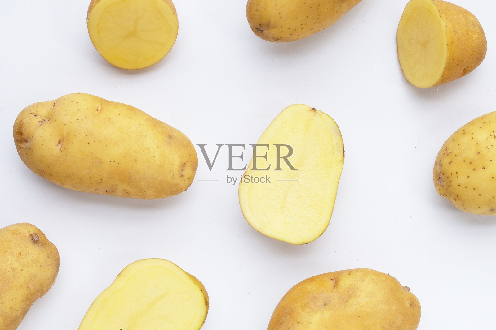 白色背景的生土豆照片摄影图片