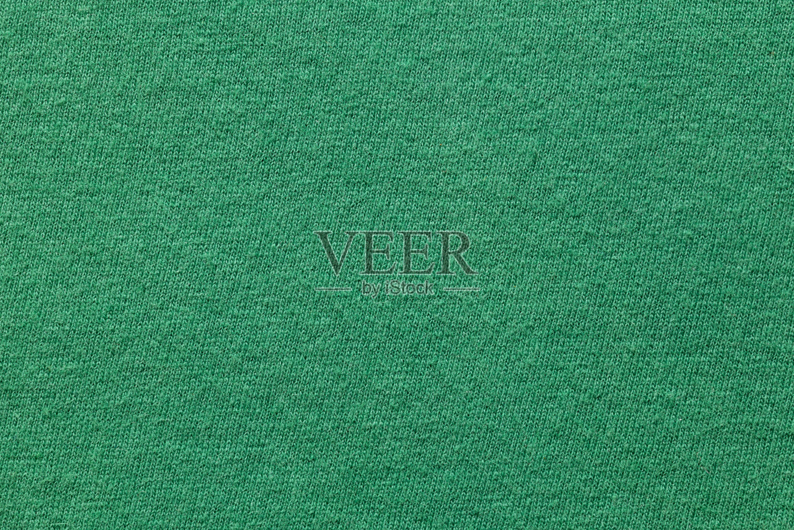 针织背景。针织棉织物的纹理接近。照片摄影图片