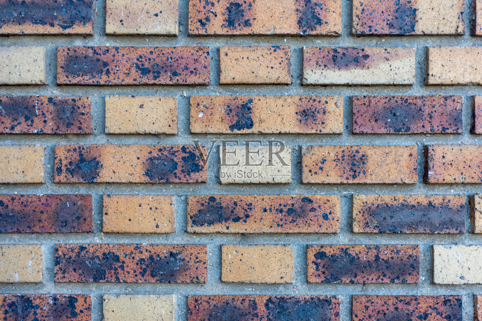 砖墙以黄色和棕色为背景照片摄影图片