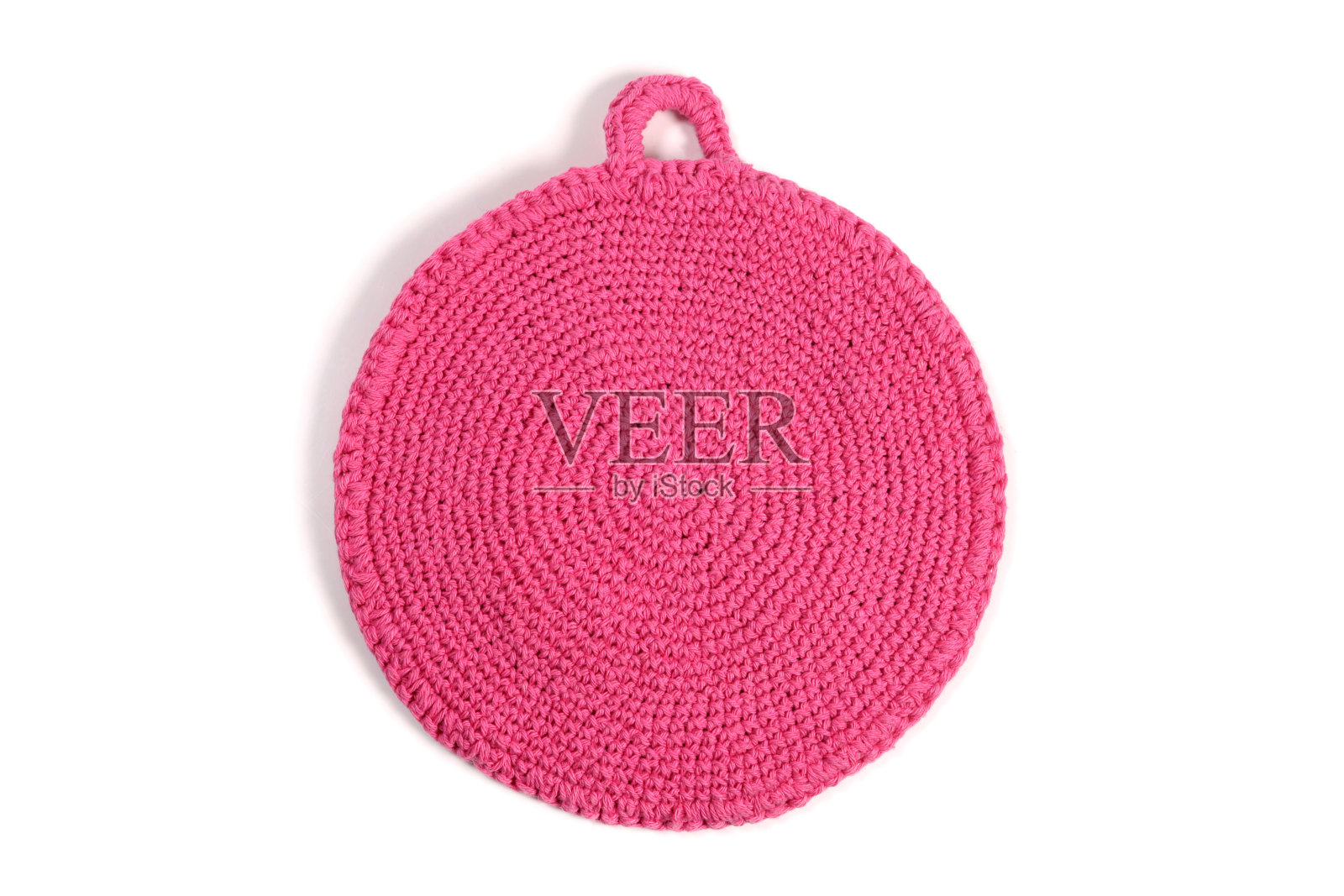 粉色手工钩针壶架孤立的白色照片摄影图片