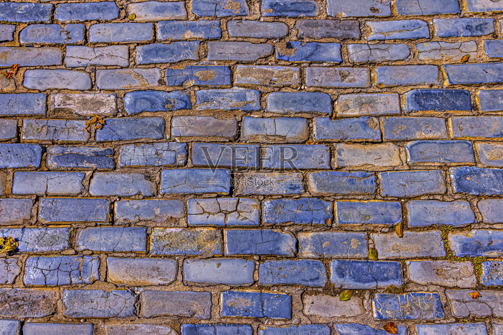 圣胡安老城鹅卵石街道上的青砖照片摄影图片