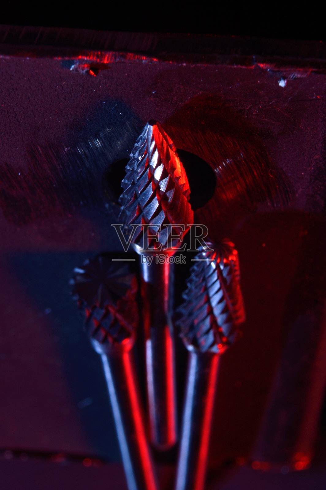 碳化钨刀具的背景金属坯料。特写镜头。照片摄影图片