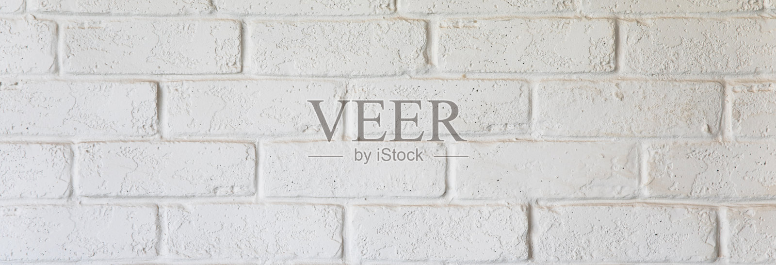 白色砖墙背景。照片摄影图片