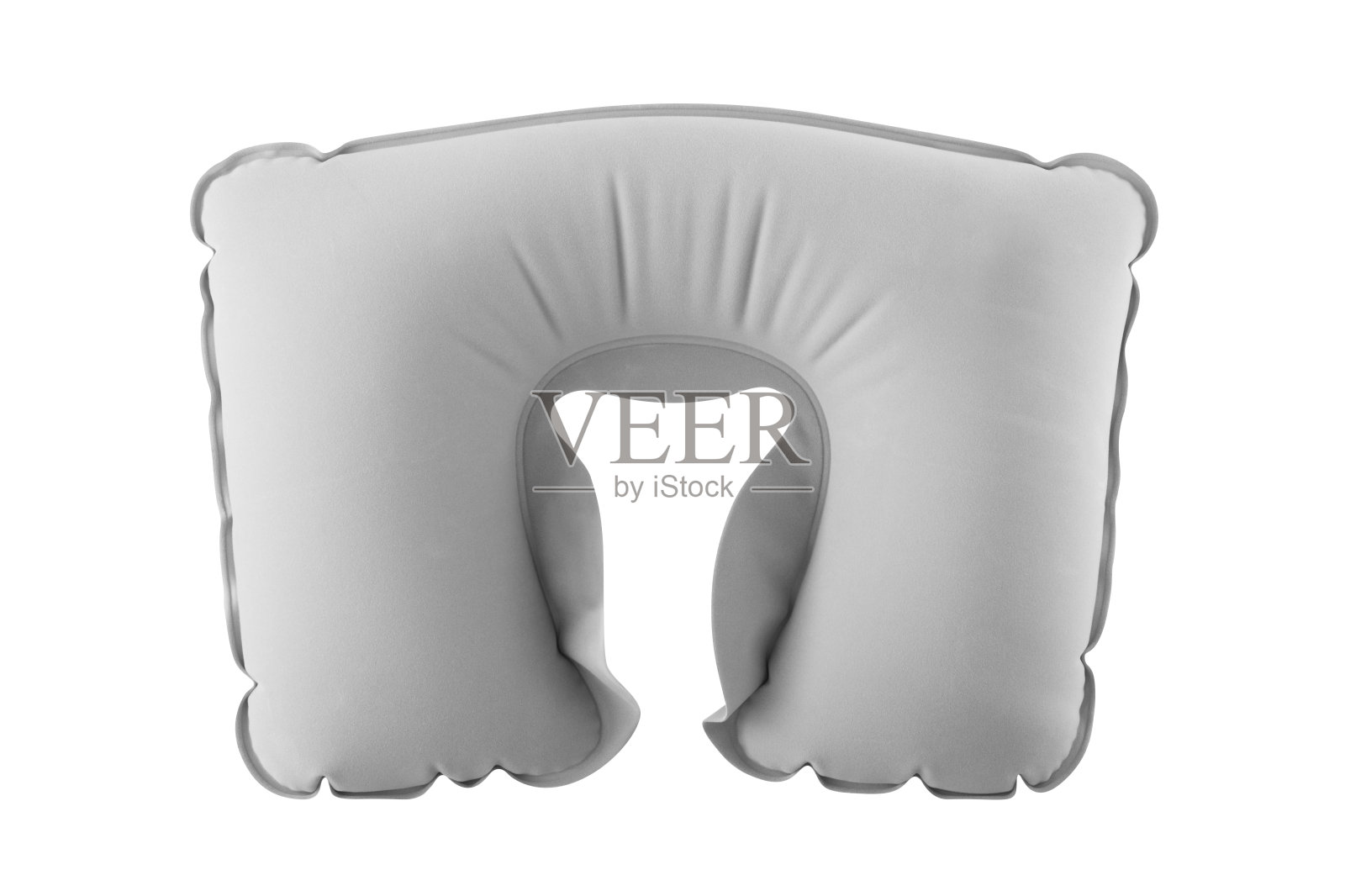 白色背景上孤立的充气灰色旅行枕照片摄影图片