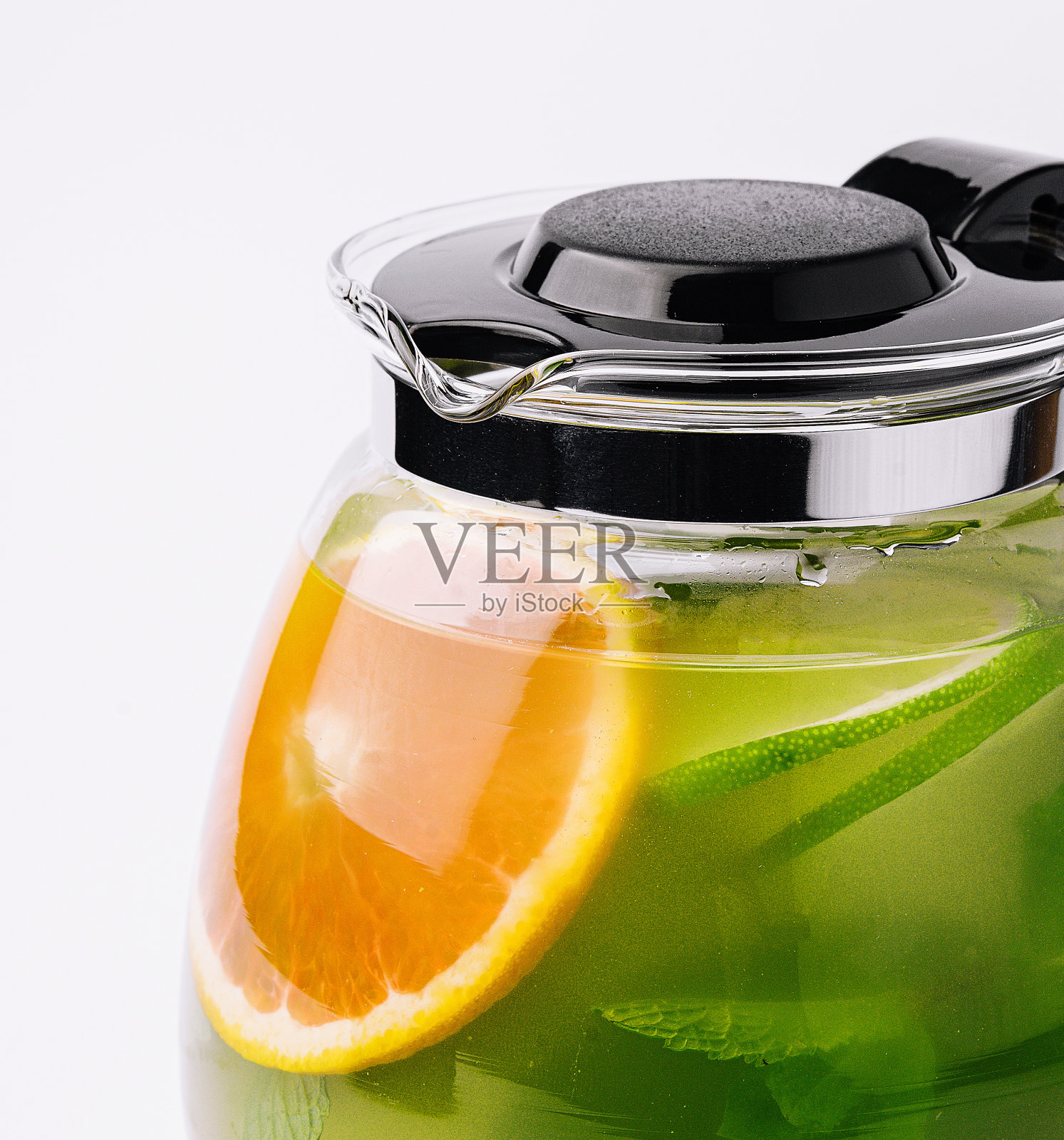 一壶美味的白底冷茶照片摄影图片