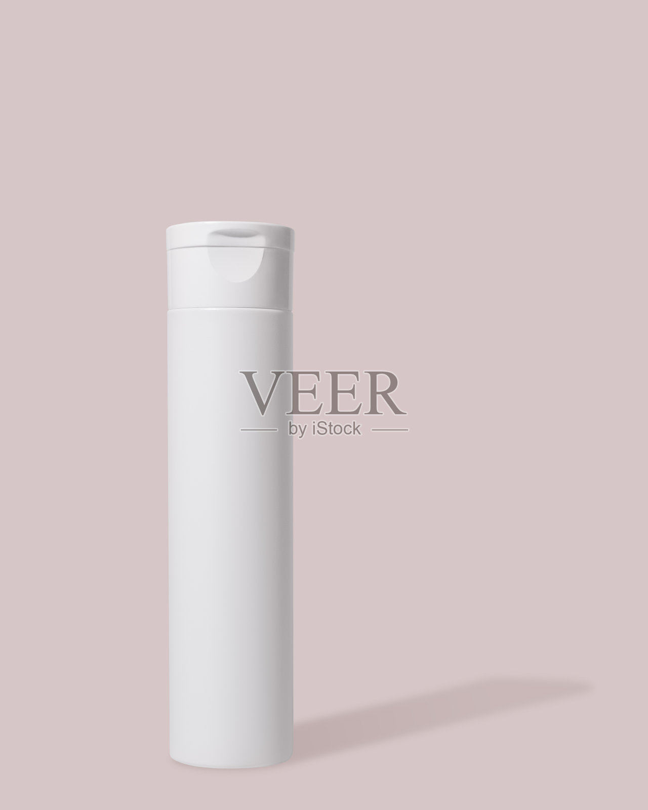 化妆品白色塑料管在粉红色的背景。乳液模型。照片摄影图片