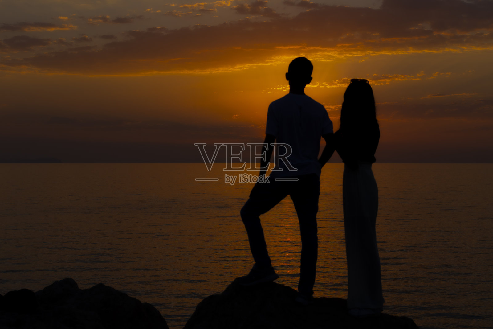 日落男女剪影照片摄影图片