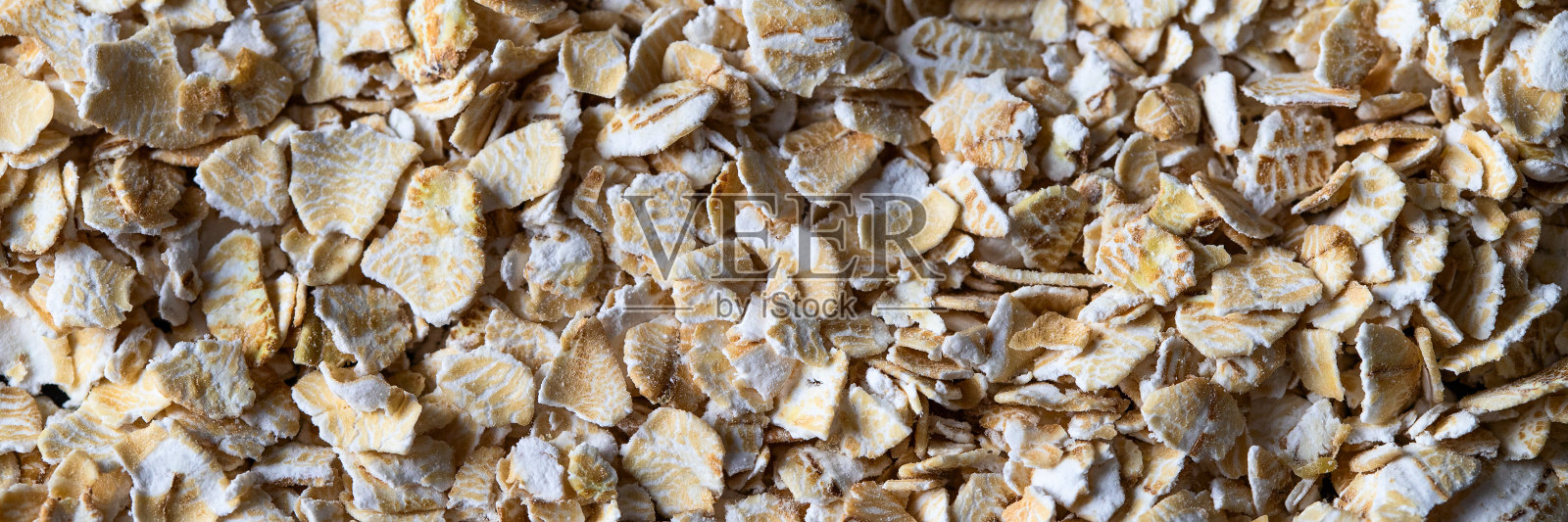 顶部视图的燕麦片纹理背景或设计。带有文本空间的横幅照片摄影图片