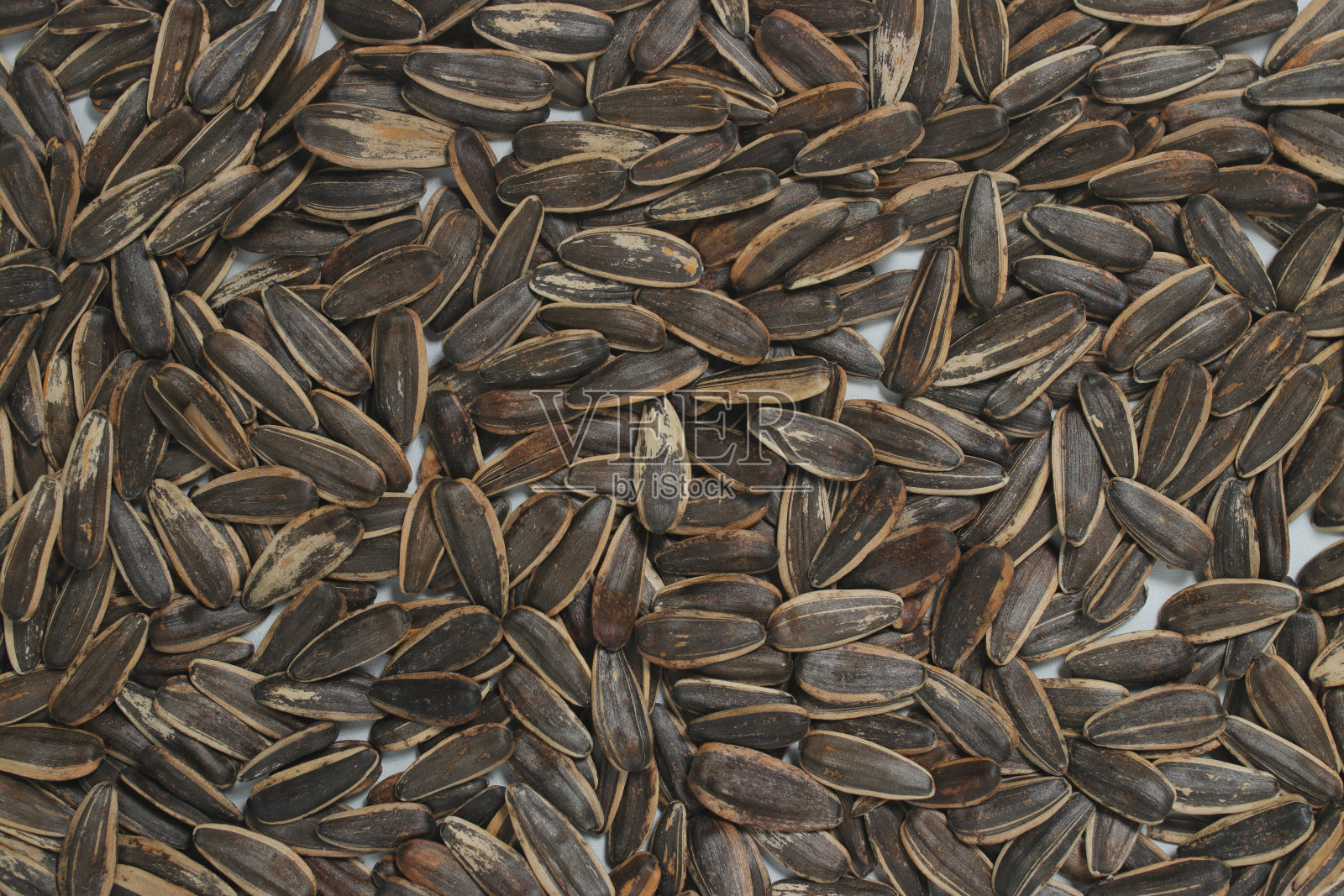 葵花籽纹理背景。照片摄影图片