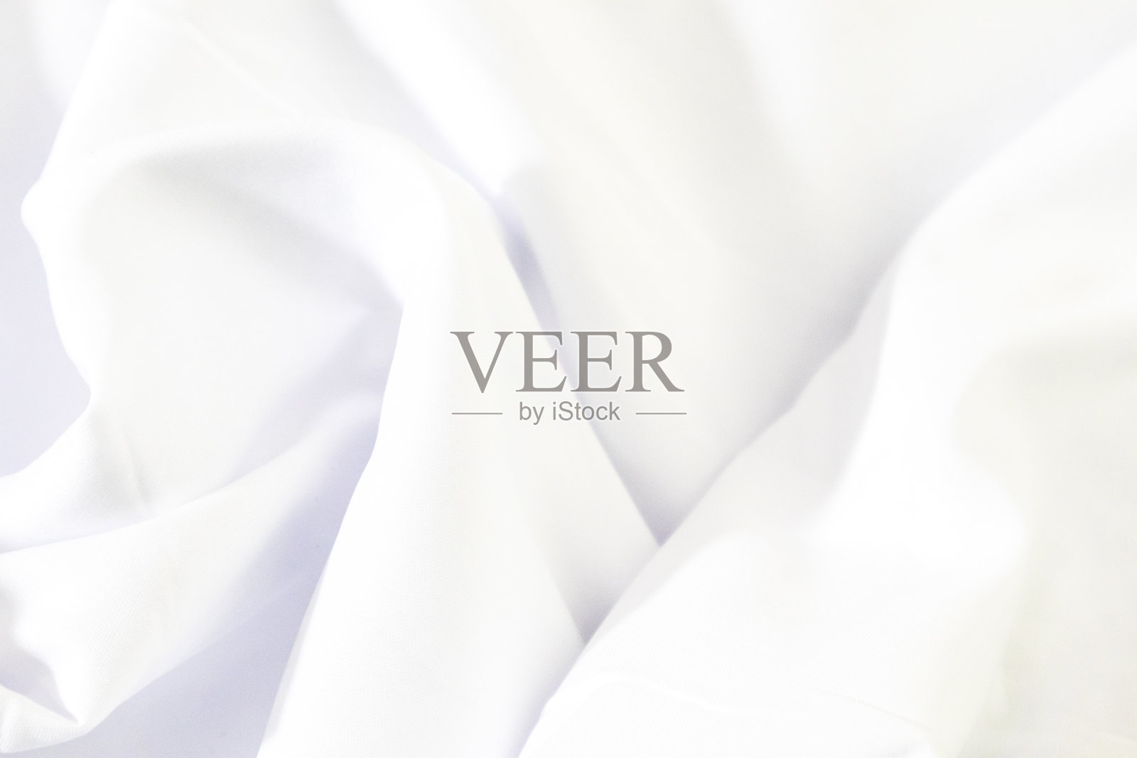 白色织物纹理背景，柔软的波浪，空间的文本或书籍设计和网页文本照片摄影图片