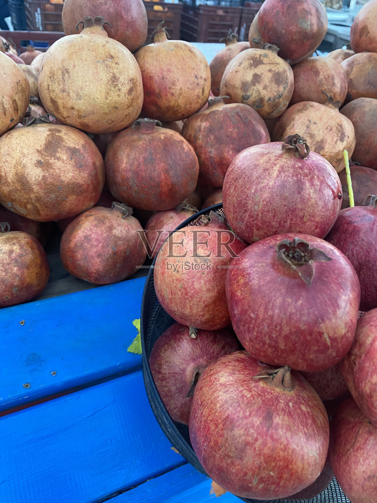 石榴专柜在市场出售照片摄影图片