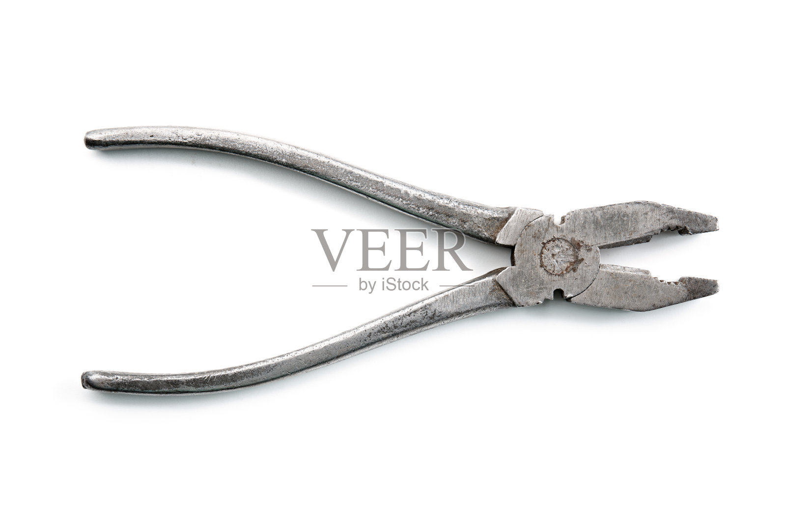 钳。钳。木制面板上的工具。古代乐器的收藏。照片摄影图片