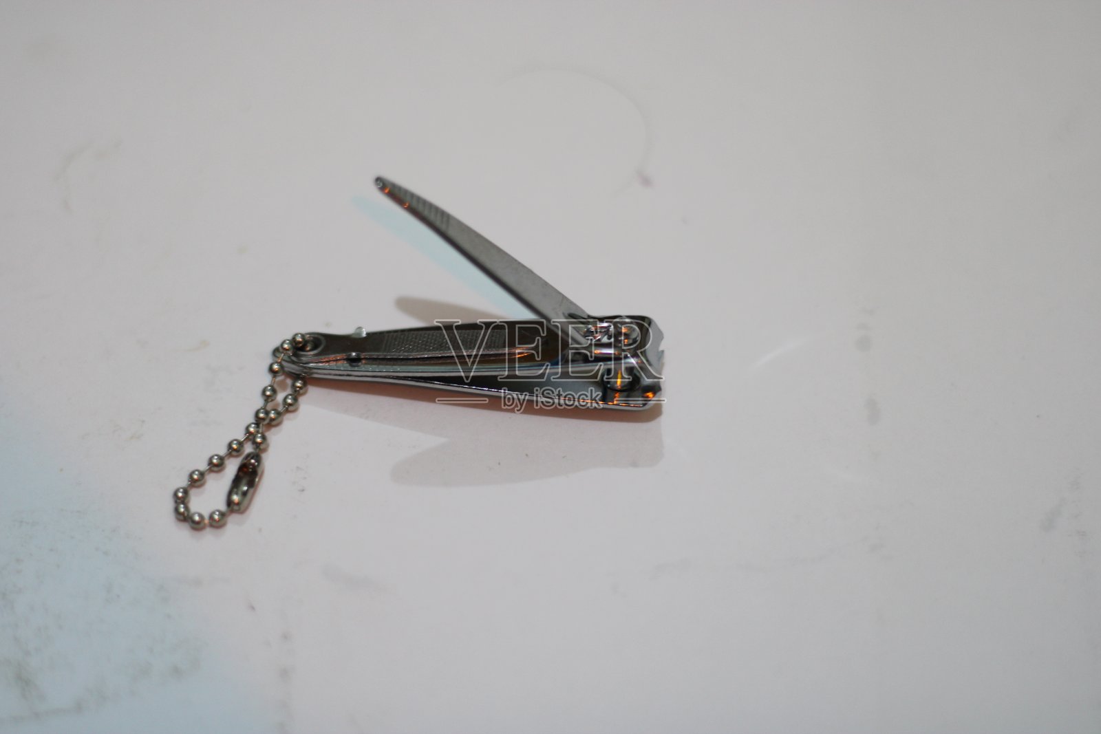 银色不锈钢指甲刀照片照片摄影图片