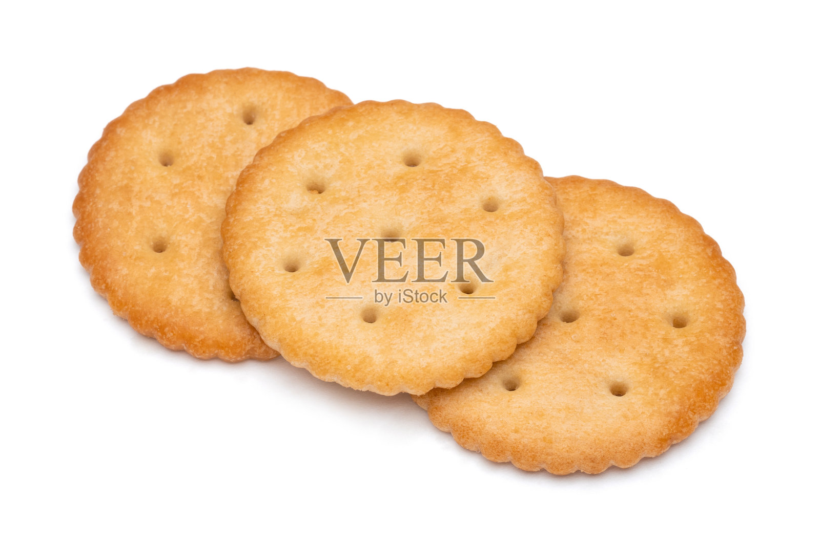 健康的全麦饼干，白色背景。白色背景上孤立的一堆苏打饼干。圆形饼干。照片摄影图片