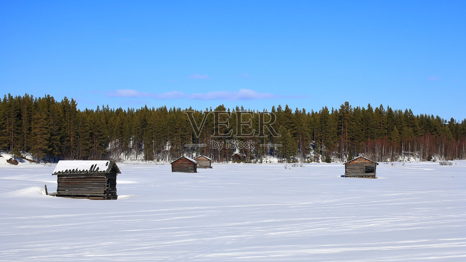 Svansele Dammangar (Svansele流水草甸)冬季的简易储物棚照片摄影图片