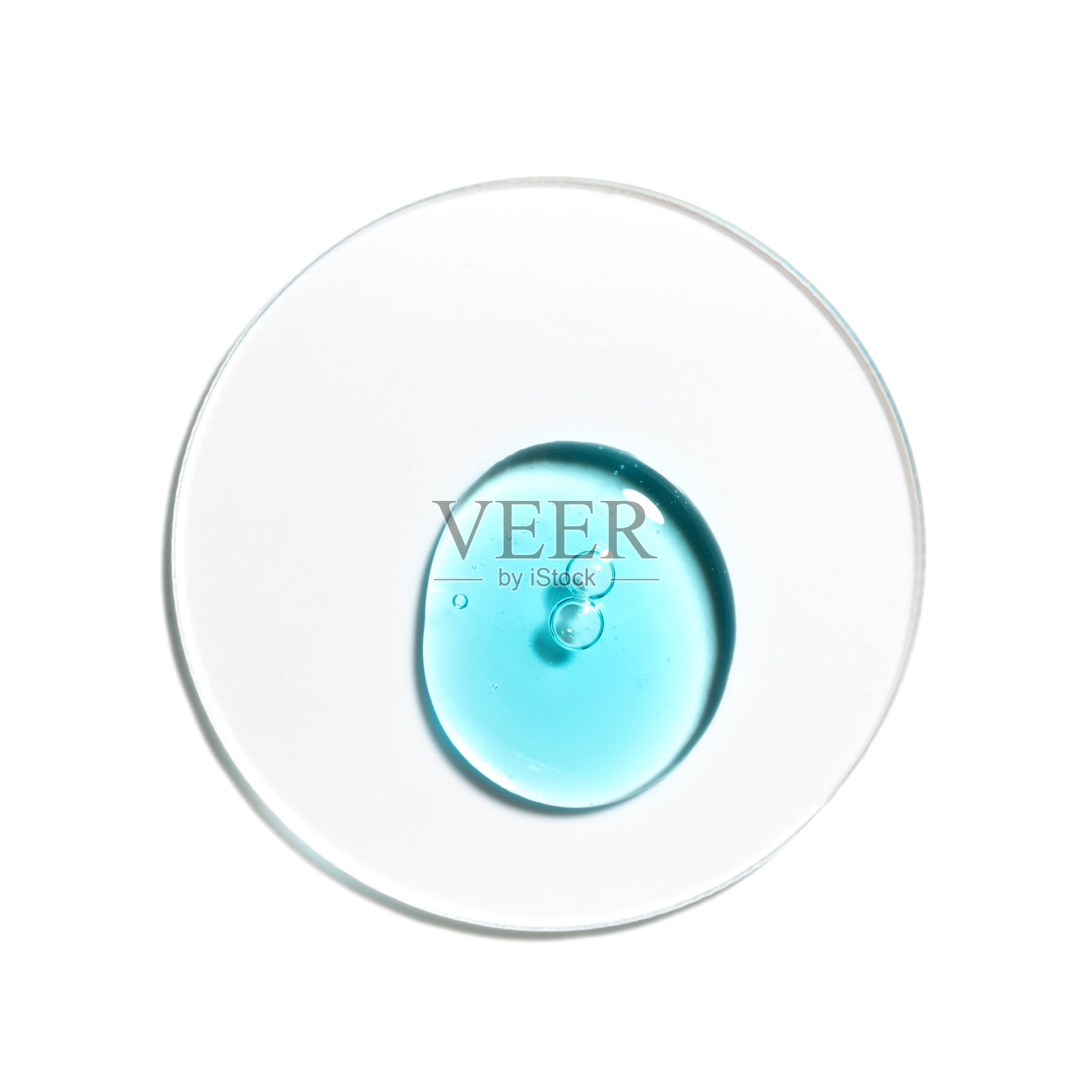 蓝色透明质酸血清凝胶在白色隔离背景，宏观纹理样本。化妆品照片摄影图片