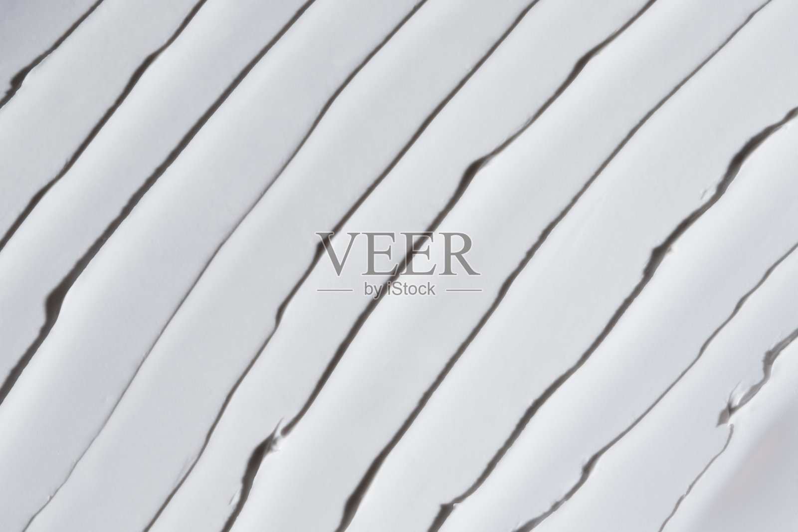 白色保湿质地。近距离刷面霜。身体乳，面膜或防晒霜。护肤美容产品。护手霜背景。护肤样品。化妆品涂抹背景。俯视图照片摄影图片