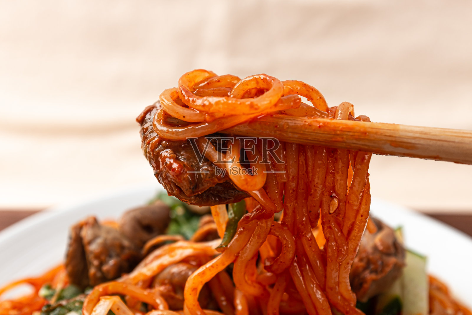 海螺拌面照片摄影图片