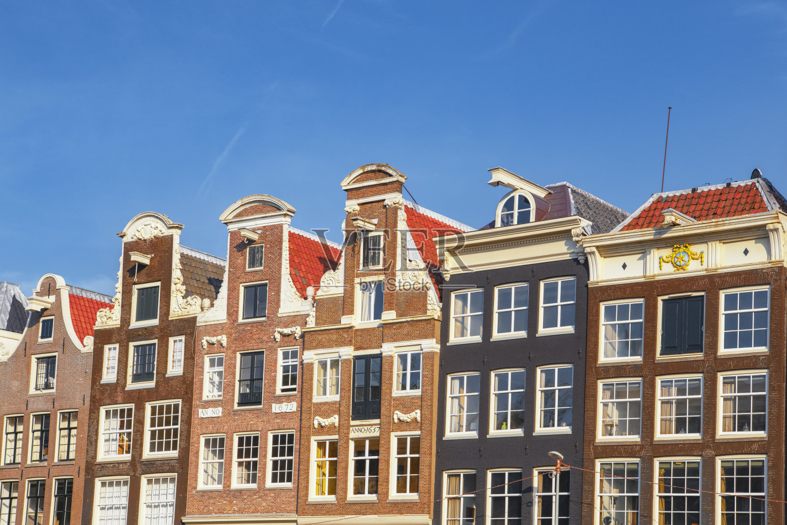 阿姆斯特丹商人住宅的外墙在市中心运河区在夏天照片摄影图片