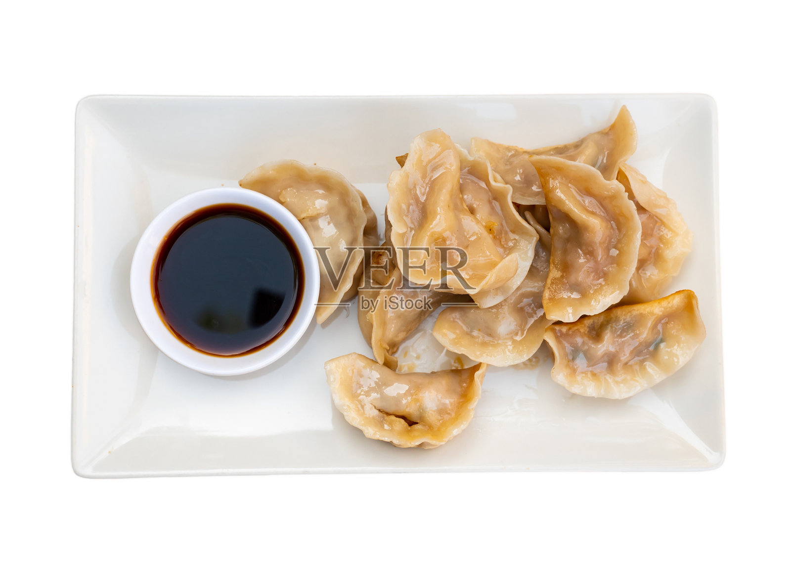 中国的炸饺子配上漂亮的酱油照片摄影图片