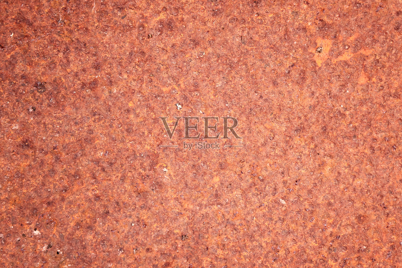 红色垃圾石纹理墙背景。抽象质朴的棕色表面。照片摄影图片