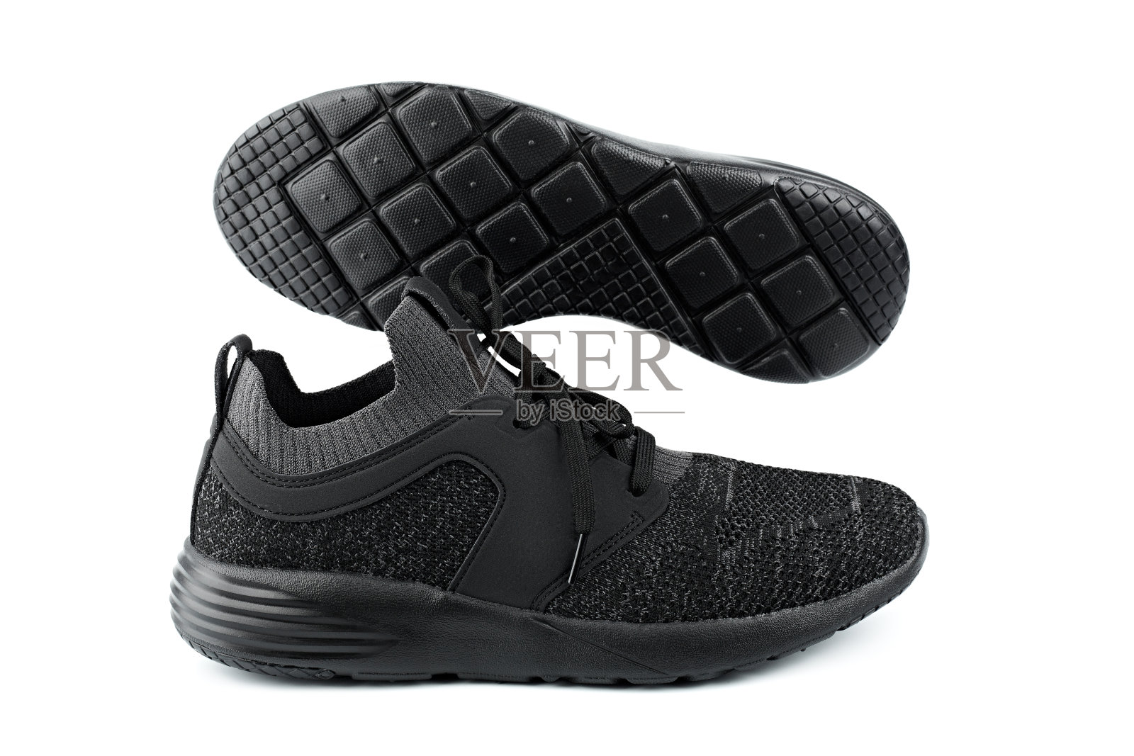 运动鞋孤立的白色背景。黑色运动鞋，跑鞋。休闲的鞋子。青春的风格。健身鞋、跑步鞋、瑜伽鞋。照片摄影图片