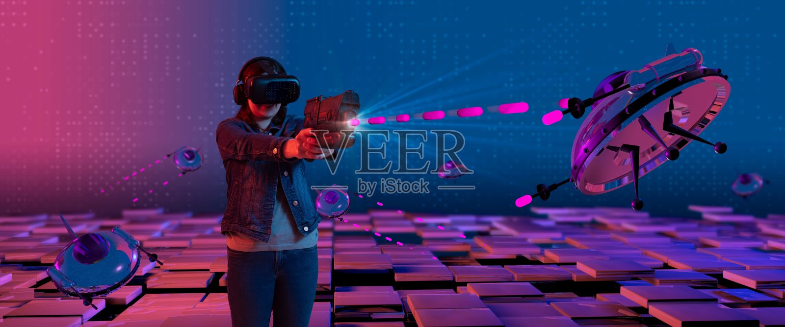 一名拉丁女子戴着虚拟现实眼镜，在电脑游戏中玩玩具枪照片摄影图片