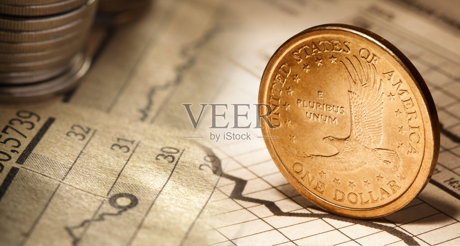 一美元在报纸上照片摄影图片